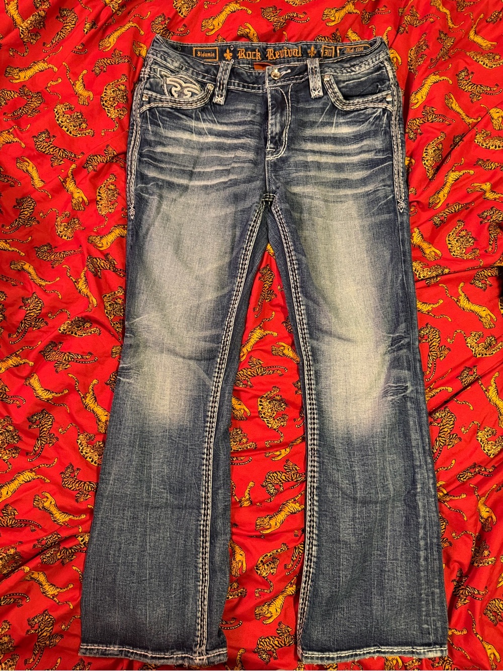 Rock Revival Women's Distressed Medium Wash Flared Jeans